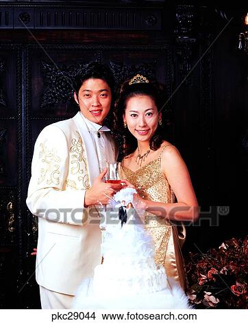 Picture - marriage, wedding ceremony, anniversary, Oriental, two people, two guys, smile. Fotosearch