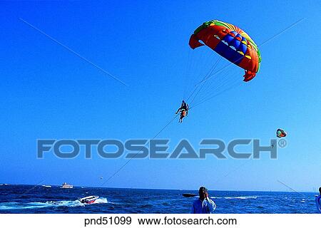 parachute, day, leisure, leisure sports, sea, boat, person View Large Photo Image Stock Photo - parachute, day, leisure, leisure sports, sea, boat, person. Fotosearch