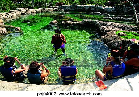 Stock Photo - sightseeing, tourism, Guam, life vest, day, Oriental, leisure. Fotosearch