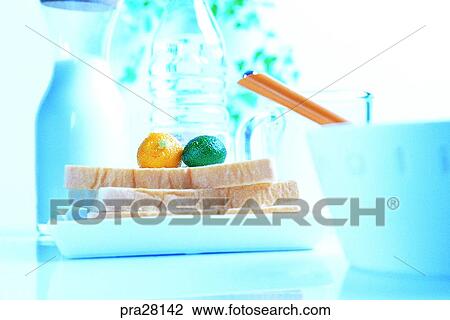 Stock Image - lifestyle, bread, milk, breakfast, table, chopsticks, fruit. Fotosearch