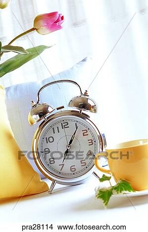 lifestyle, time, clock, alarm clock, cup, cushion, curtain View Large Photo Image Picture - lifestyle, time, clock, alarm clock, cup, cushion, curtain. Fotosearch