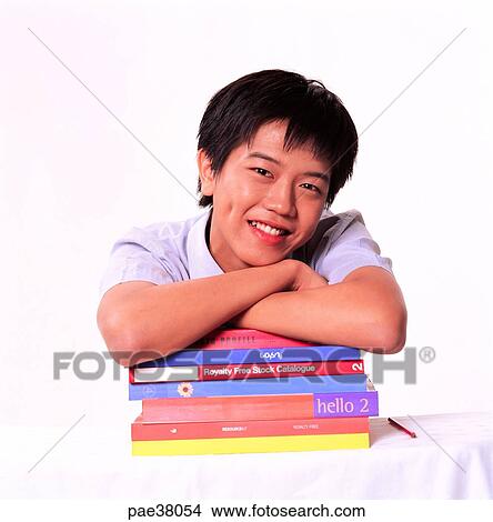 student, students, school boy, boy student, book, books, file View Large Photo Image Picture - student, students, school boy, boy student, book, books, file. Fotosearch