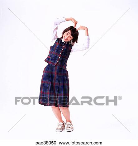 Stock Image - student, students, school girl, girl student, young boys, young girls, teenagers. Fotosearch