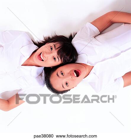 Stock Image - student, students, school girl, girl student, young boys, young girls, teenagers. Fotosearch