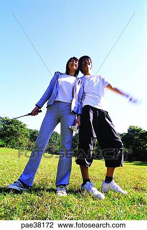 Stock Image - student, students, school boy, boy student, school girl, girl student, young. Fotosearch