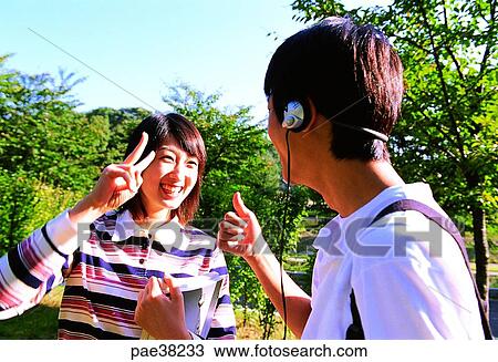 Stock Image - student, students, school boy, boy student, school girl, girl student, book. Fotosearch