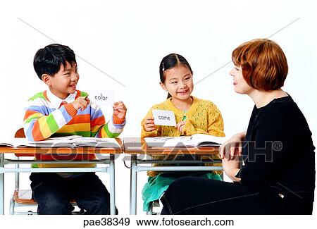 Stock Photo - child, children, young, conversation, speaker, lecturer, school. Fotosearch