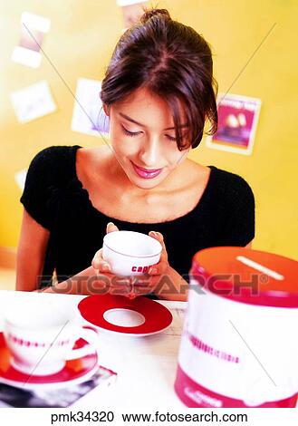 Stock Image - lifestyle, woman, female, cup, teacup, coffee, tea. Fotosearch