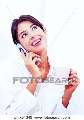 lifestyle, woman, female, cup, teacup, coffee, cellurphone View Large Photo Image Stock Photography - lifestyle, woman, female, cup, teacup, coffee, cellurphone. Fotosearch