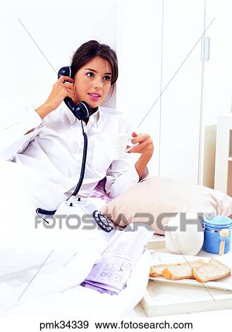 lifestyle, woman, female, telephone, telephones, communication, telephone call View Large Photo Image Stock Photo - lifestyle, woman, female, telephone, telephones, communication, telephone call. Fotosearch