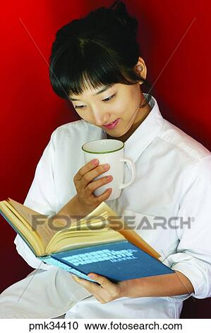 woman, female, book, books, cup, teacup, coffee View Large Photo Image Stock Image - woman, female, book, books, cup, teacup, coffee. Fotosearch