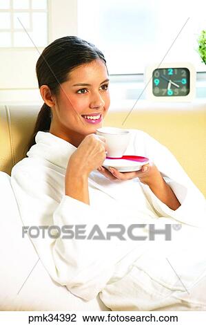 woman, female, gown, bath gown, table clock, cup, teacup View Large Photo Image Stock Image - woman, female, gown, bath gown, table clock, cup, teacup. Fotosearch
