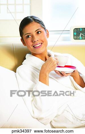 woman, female, gown, bath gown, table clock, cup, teacup View Large Photo Image Stock Photo - woman, female, gown, bath gown, table clock, cup, teacup. Fotosearch