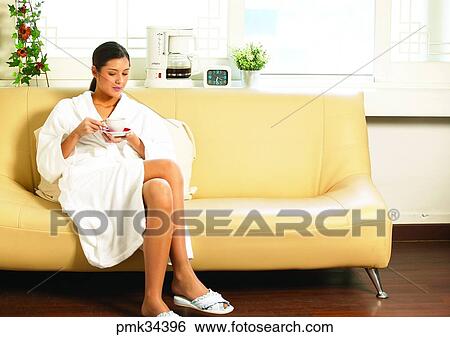 woman, female, gown, bath gown, table clock, cup, teacup View Large Photo Image Stock Photograph - woman, female, gown, bath gown, table clock, cup, teacup. Fotosearch