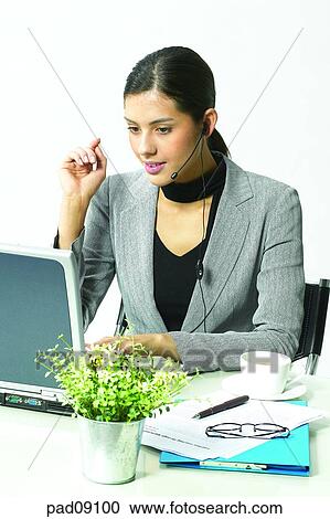 Stock Image - business, woman, female, person, indoor, interior, person. Fotosearch