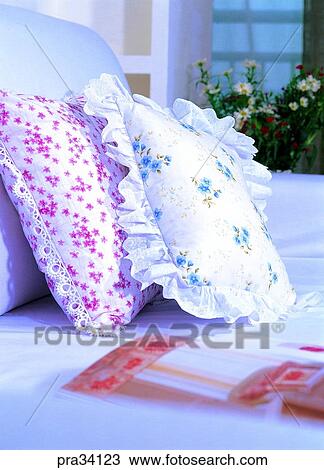 Stock Image - living, life, cousion, bedroom, bed, magazine, journal. Fotosearch