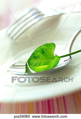 Stock Image - living, life, fork, plate, platter, plant, plants. Fotosearch