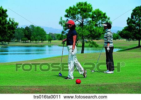 person, woman, Asian, golf field, golf club, golf pose,?? View Large Photo Image Stock Image - person, woman, Asian, golf field, golf club, golf pose,??. Fotosearch