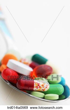 medical treatment, medicine, pill, drug, capsule, medicine, spoon View Large Photo Image Stock Photo - medical treatment, medicine, pill, drug, capsule, medicine, spoon. Fotosearch