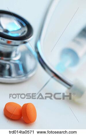 medical treatment, medicine, stethoscope, syringe, injection, pill, drug View Large Photo Image Stock Image - medical treatment, medicine, stethoscope, syringe, injection, pill, drug. Fotosearch