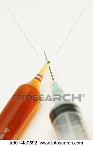 Stock Image - medical treatment, medicine, drugstuffs, injection, syringe. Fotosearch