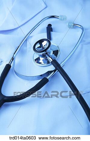 Stock Image - medical treatment, medicine, doctorgown, gown, stethoscope. Fotosearch