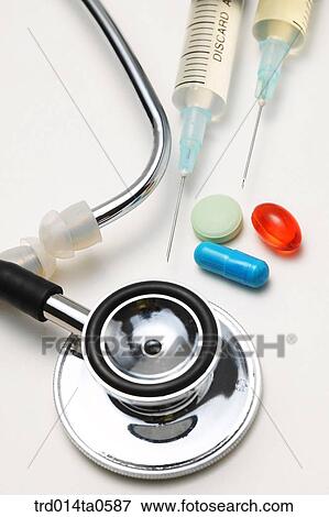 medical treatment, medicine, stethoscope, syringe, injection, pill, drug View Large Photo Image Stock Photo - medical treatment, medicine, stethoscope, syringe, injection, pill, drug. Fotosearch