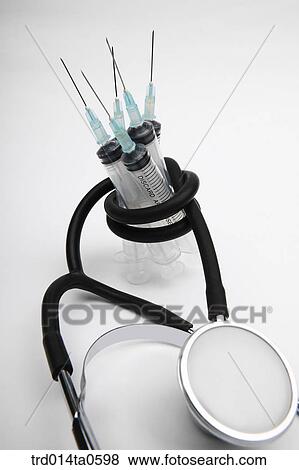 medical treatment, medicine, stethoscope, syringe, injection View Large Photo Image Stock Photo - medical treatment, medicine, stethoscope, syringe, injection. Fotosearch