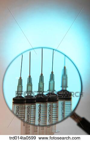 medical treatment, medicine, spectacles, syringe, injection View Large Photo Image Stock Photo - medical treatment, medicine, spectacles, syringe, injection. Fotosearch
