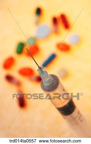medical treatment, medicine, syringe, injection, drug, pill, capsule View Large Photo Image Stock Photo - medical treatment, medicine, syringe, injection, drug, pill, capsule. Fotosearch