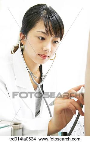 person, medical treatment, medicine, indoor, hospital, doctor, stethoscope View Large Photo Image Picture - person, medical treatment, medicine, indoor, hospital, doctor, stethoscope. Fotosearch