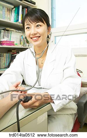 person, medical treatment, medicine, woman, Korean, doctor, stethoscope View Large Photo Image Stock Image - person, medical treatment, medicine, woman, Korean, doctor, stethoscope. Fotosearch