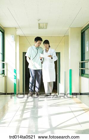 person, medical treatment, medicine, indoor, corridor, hospital, hospitalcorridor View Large Photo Image Stock Image - person, medical treatment, medicine, indoor, corridor, hospital, hospitalcorridor. Fotosearch