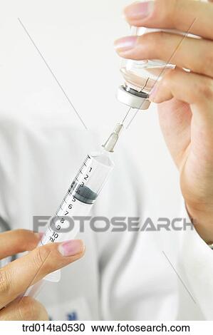 person, medical treatment, medicine, hand, syringe, injection, medicine View Large Photo Image Stock Image - person, medical treatment, medicine, hand, syringe, injection, medicine. Fotosearch