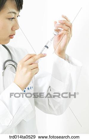 person, medical treatment, medicine, woman, Korean, doctor, syringe View Large Photo Image Stock Photo - person, medical treatment, medicine, woman, Korean, doctor, syringe. Fotosearch