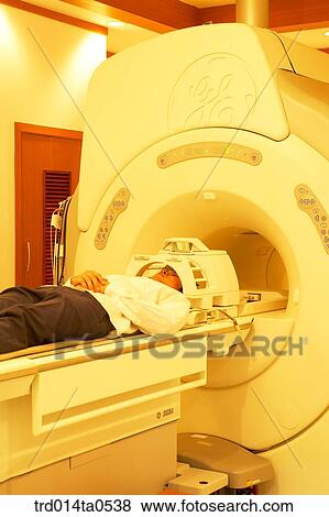 person, medical treatment, medicine, indoor, hospital, CT photographing, CT View Large Photo Image Stock Photo - person, medical treatment, medicine, indoor, hospital, CT photographing, CT. Fotosearch