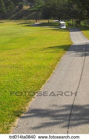 Stock Image - golf, field, car. Fotosearch
