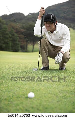 Stock Image - person, leisure, free time, hobby, golf, field, Korean. Fotosearch