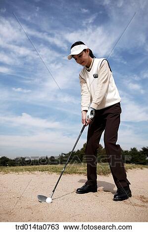 Stock Image - person, leisure, free time, hobby, golf, field, Korean. Fotosearch