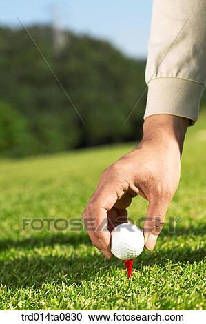 Stock Image - person, leisure, free time, hobby, golf, field, hand. Fotosearch