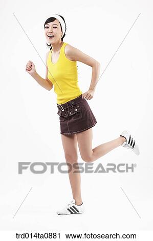 Stock Image - person, woman, Korean, room, pose, posture, concept. Fotosearch