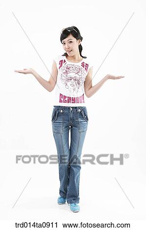 Stock Image - person, woman, Korean, room, pose, posture, concept. Fotosearch