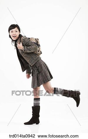 Stock Image - person, woman, Korean, room, pose, posture, concept. Fotosearch