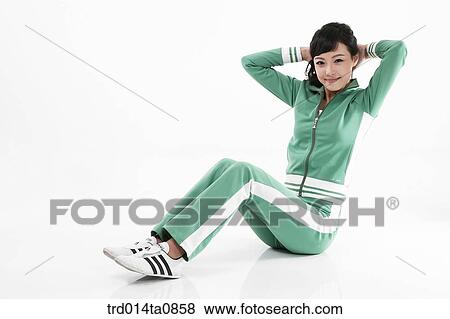Stock Photo - person, woman, Korean, room, pose, posture, concept. Fotosearch