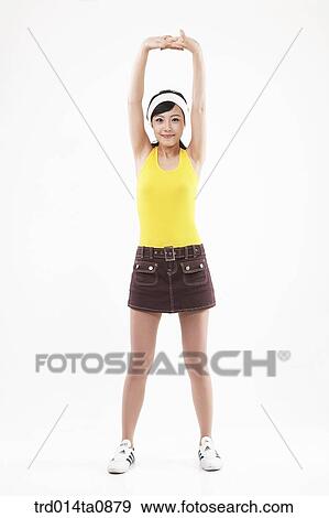 Stock Photo - person, woman, Korean, room, pose, posture, concept. Fotosearch