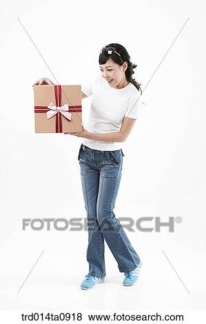 Stock Photo - person, woman, Korean, room, pose, posture, concept. Fotosearch