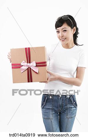 Stock Photo - person, woman, Korean, room, pose, posture, concept. Fotosearch