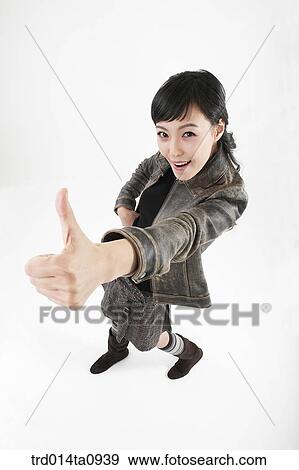 Stock Photo - person, woman, Korean, room, pose, posture, concept. Fotosearch