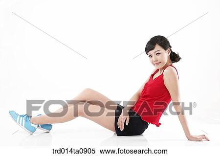 Stock Photography - person, woman, Korean, room, pose, posture, concept. Fotosearch