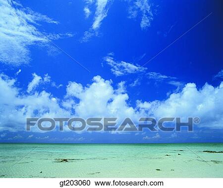 Stock Image - cloud, clouds, white cloud, sea, beach, seashore, sky. Fotosearch